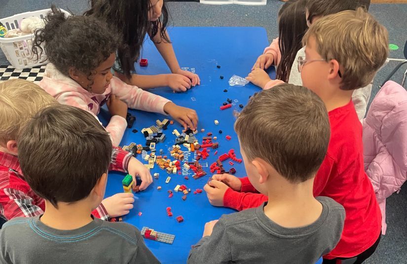 students playing with legos